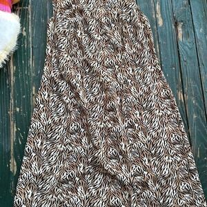 Brown + white zebra print dress with a flowy fit and a slit on the side 18